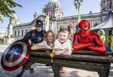 Young Daithi Mac Gabhann celebrates his Freedom of the City conferment with (former ) Lord Mayor Cllr Tina Black and some of his favourite Superheroes!
